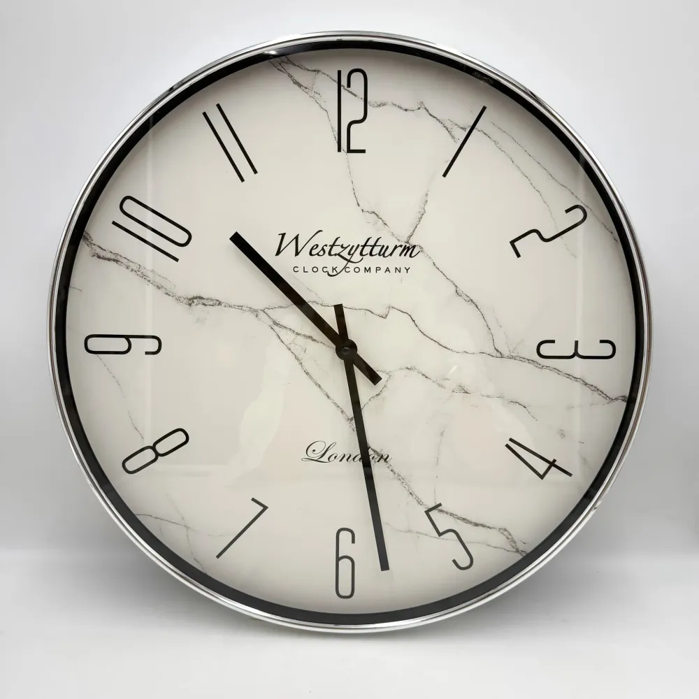 Reloj de pared redondo de metal efecto mármol 50 cm Petra Decora